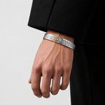 First Arrow's 12mm Arabesque Bangle with 18k Gold Sunburst Emblem