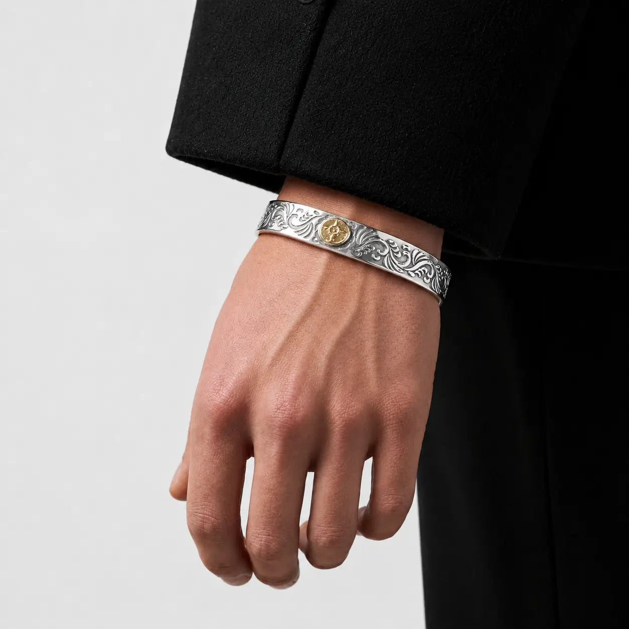First Arrow's 12mm Arabesque Bangle with 18k Gold Sunburst Emblem