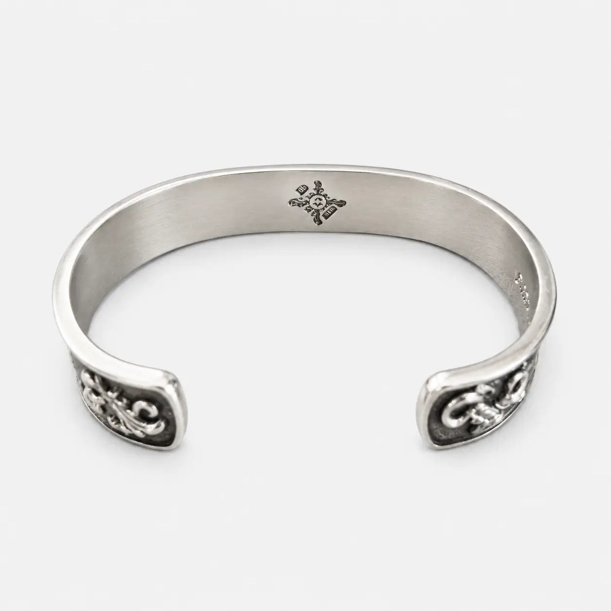 First Arrow's 12mm Arabesque Bangle with 18k Gold Sunburst Emblem