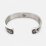 First Arrow's 12mm Arabesque Bangle with 18k Gold Sunburst Emblem