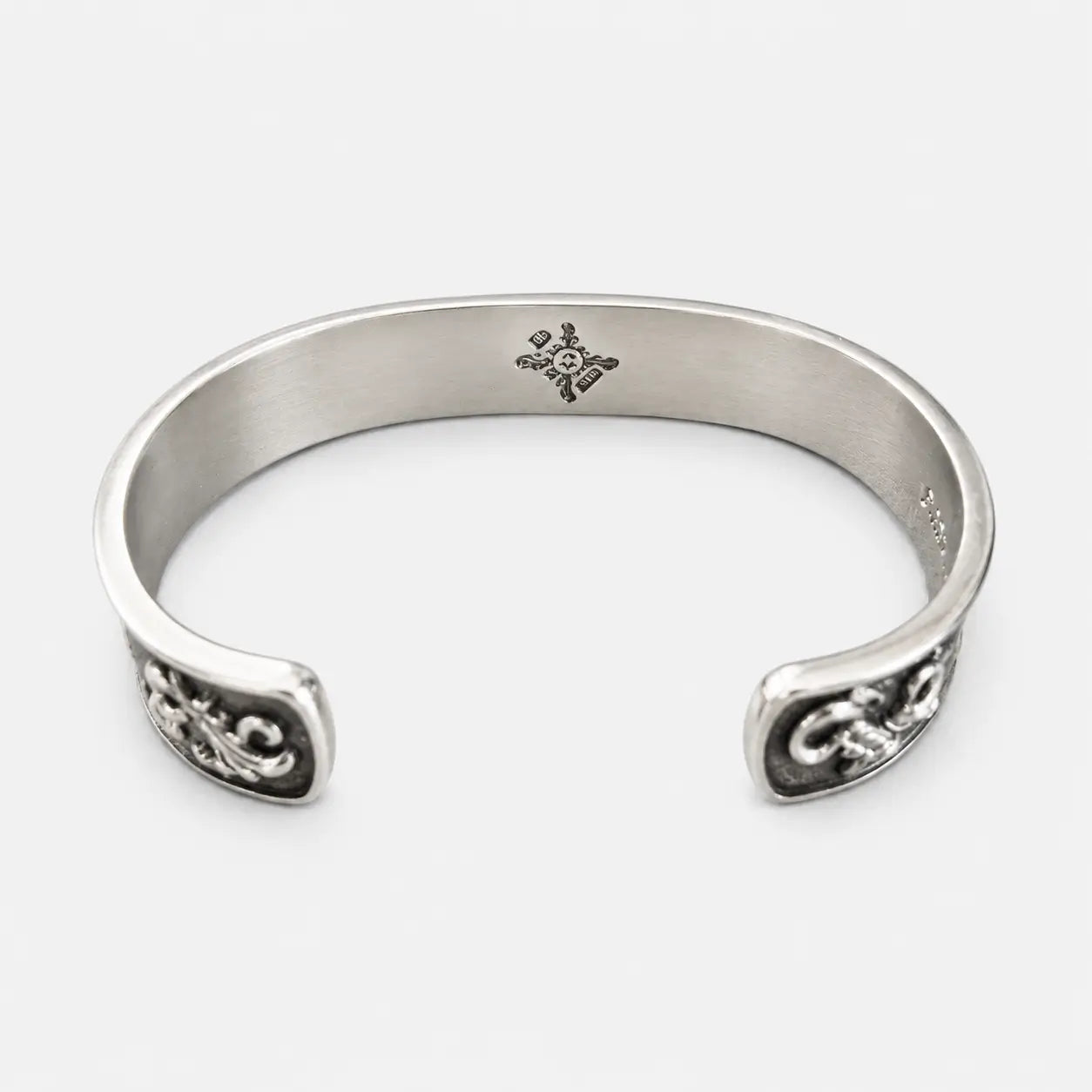First Arrow's 12mm Arabesque Bangle with 18k Gold Sunburst Emblem