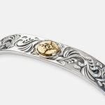 First Arrow's 12mm Arabesque Bangle with 18k Gold Sunburst Emblem
