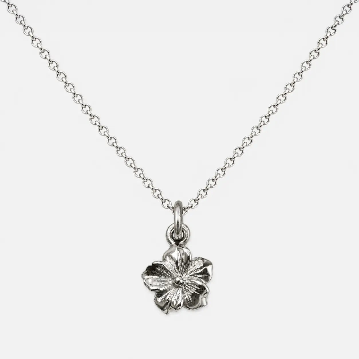 First Arrow's Silver Flower Metal Pendant (M)