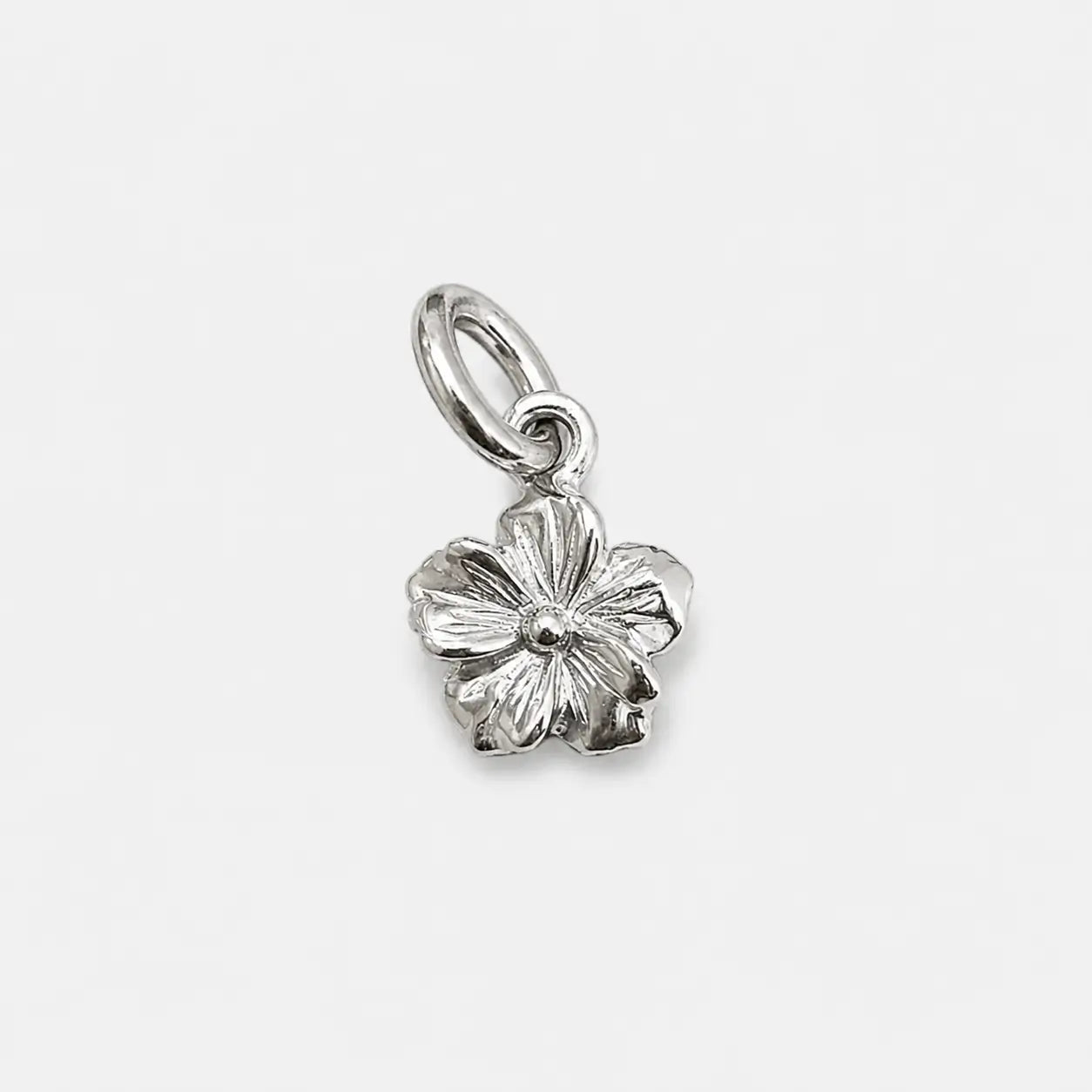 First Arrow's Silver Flower Metal Pendant (M)