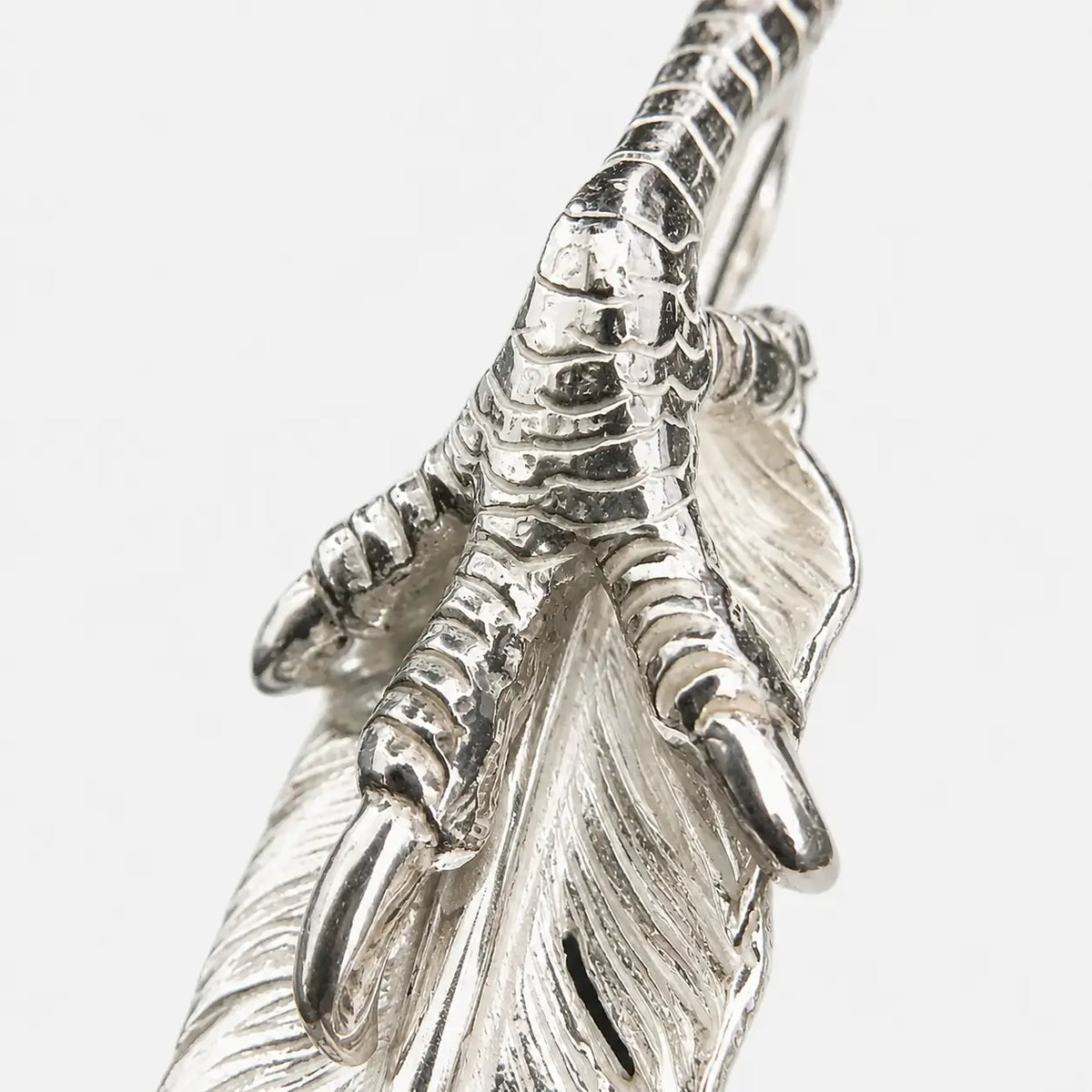 Goros Feather With Silver Claw - Facing Left