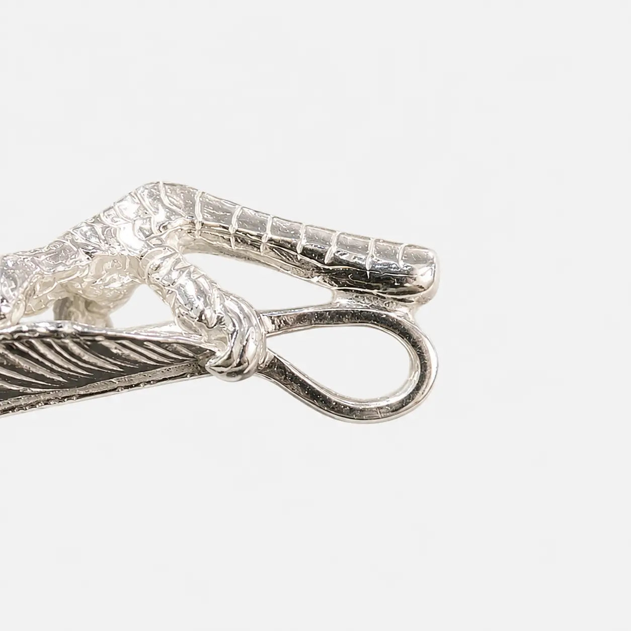 Goros Feather With Silver Claw - Facing Left