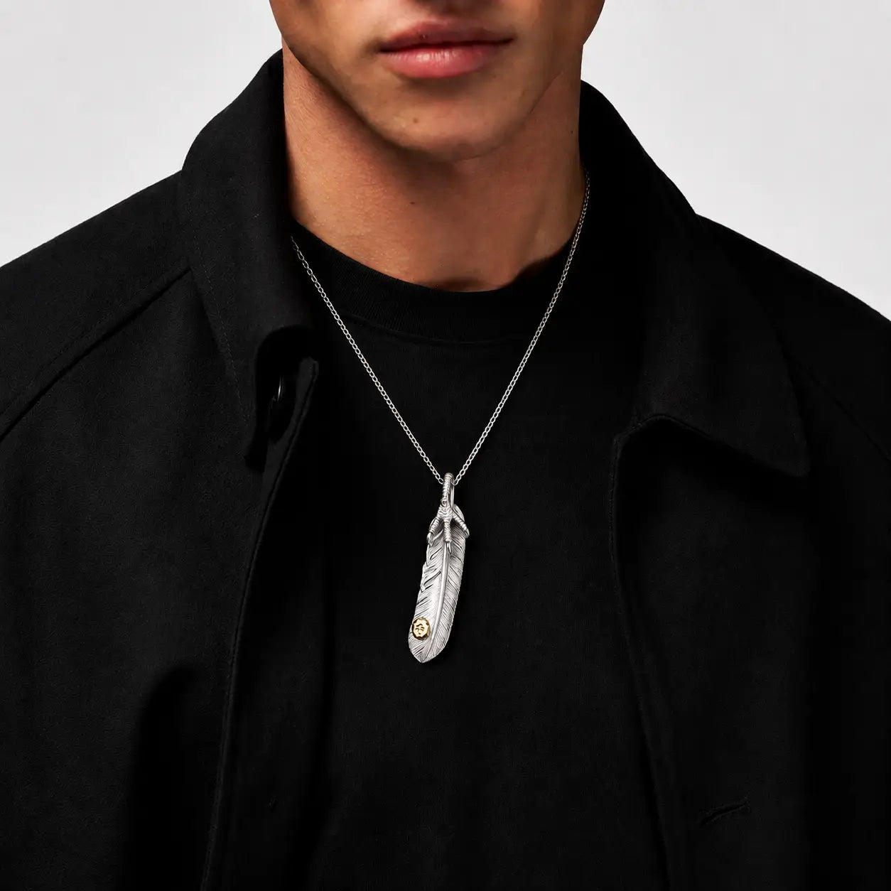Goros Feather With Silver Claw - Facing Right