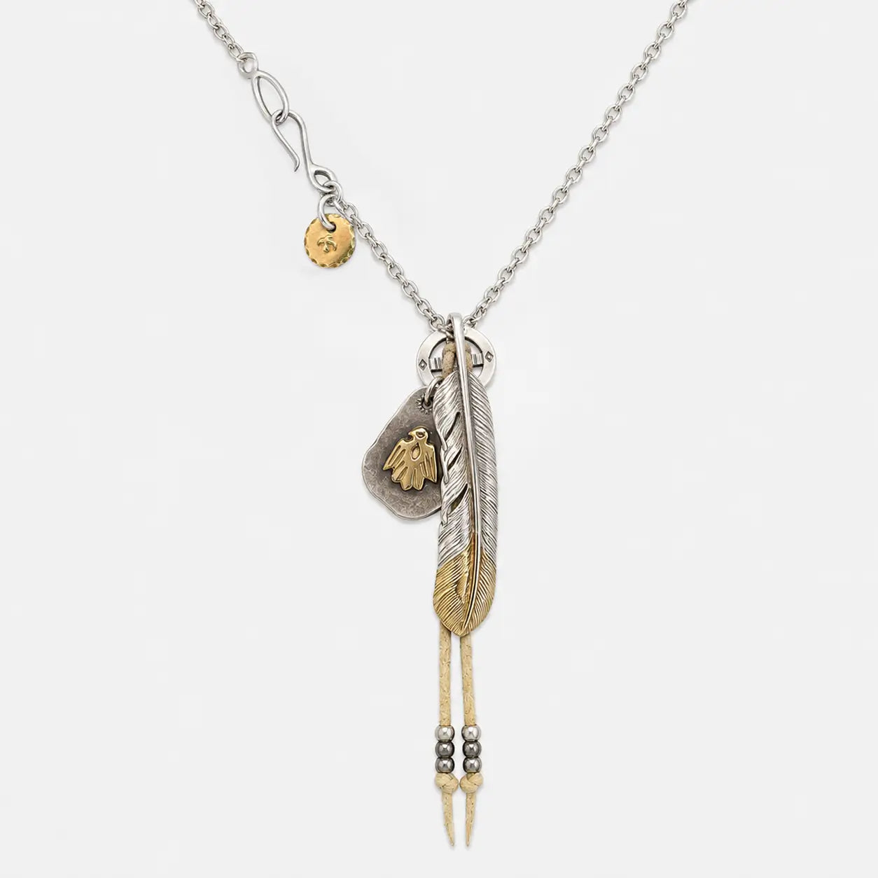 Goros Gold Tip Feather with Leather Cord Setup