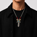 Goros Turquoise Feather With Red Beads Leather Cord Setup